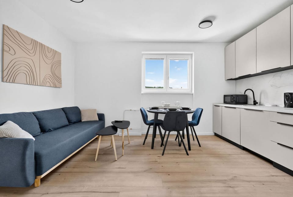 Kitchen or kitchenette, Living room, Seating area, Dining area