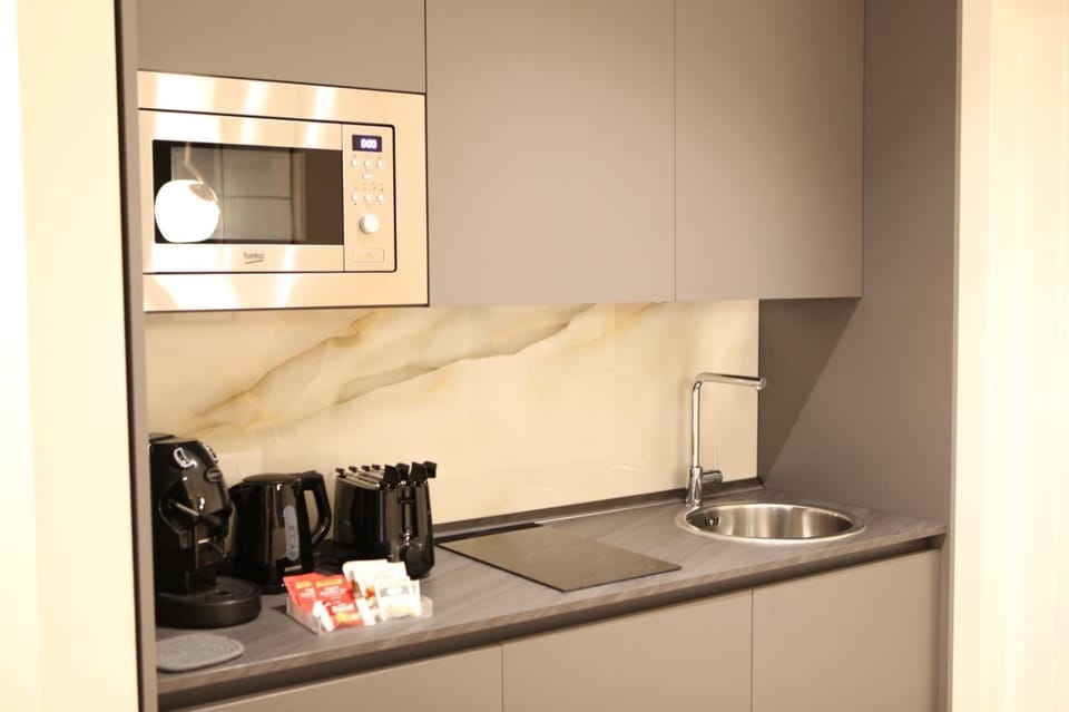 Coffee/tea facilities, Kitchen or kitchenette, minibar, stove, toaster