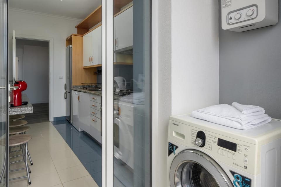 Kitchen or kitchenette, washing machine