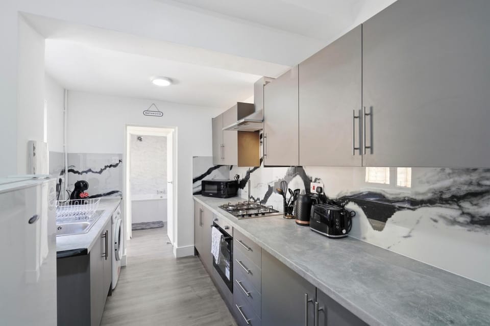 Kitchen or kitchenette, oven, stove