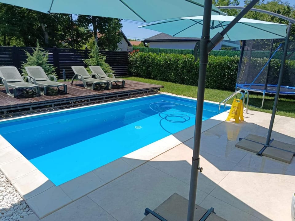 Patio, Day, Garden view, Pool view, Swimming pool, sunbed