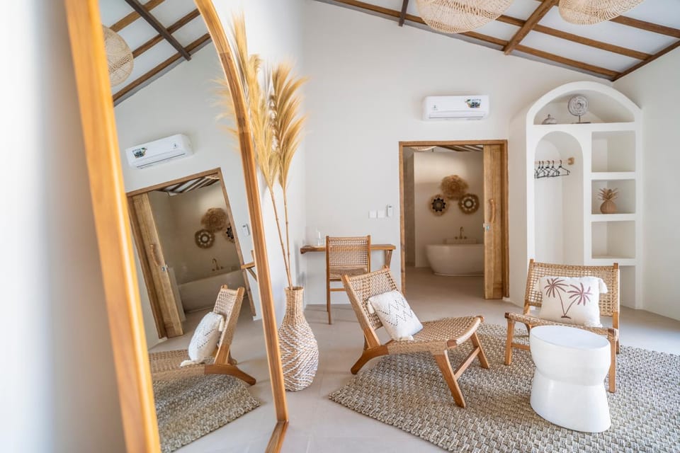 Bed, Bathroom, Seating area, Bedroom, air conditioner
