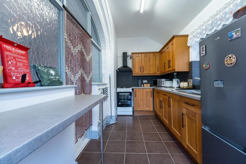 Kitchen or kitchenette, oven, stove, toaster