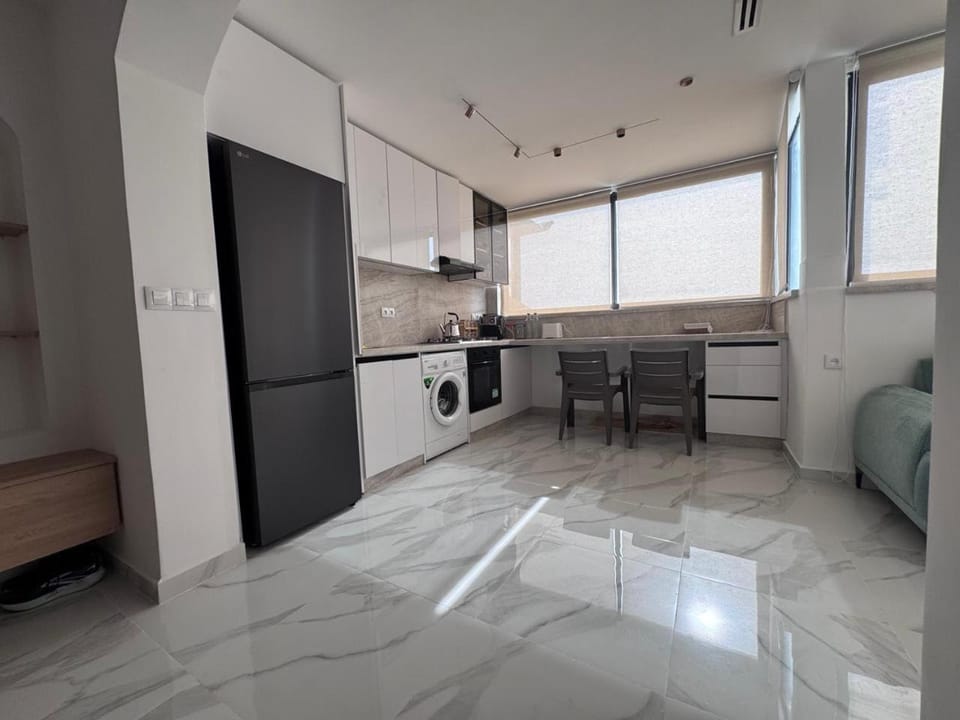 Kitchen or kitchenette, Dining area, washing machine, dryer
