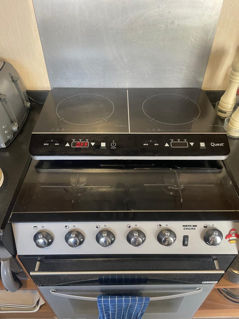 Kitchen or kitchenette, stove