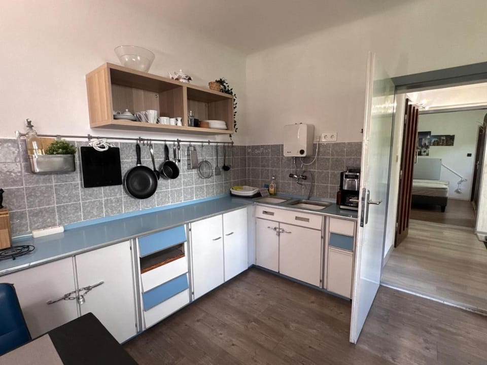 Kitchen or kitchenette, stove