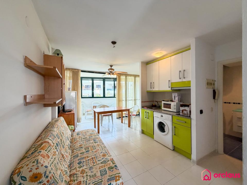 Kitchen or kitchenette, washing machine