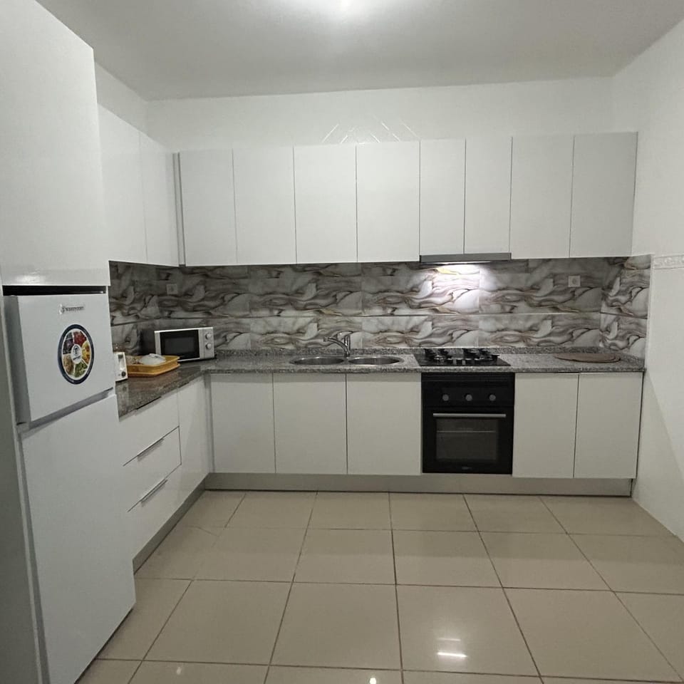Kitchen or kitchenette, oven, stove