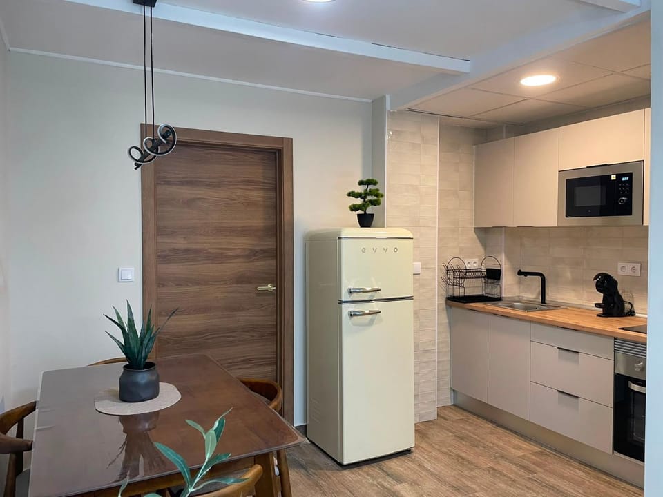 Kitchen or kitchenette, oven, stove