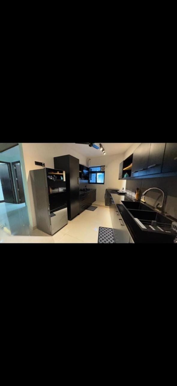 Bliss by Glass Loft-Fully furnished 2BHK near KIMS Hospital Apartment in Thiruvananthapuram