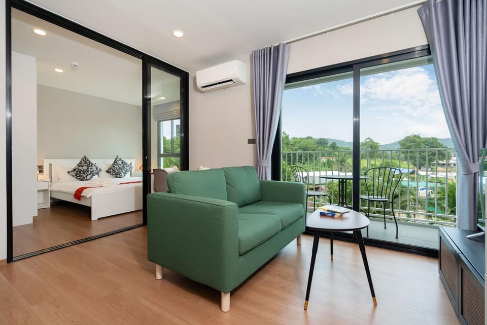 View (from property/room), Balcony/Terrace, Living room, Photo of the whole room, Seating area, Bedroom, air conditioner