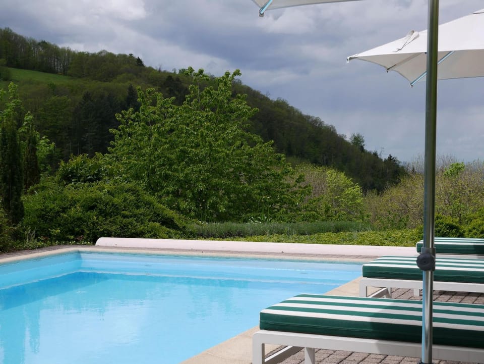 Property building, Living room, Swimming pool