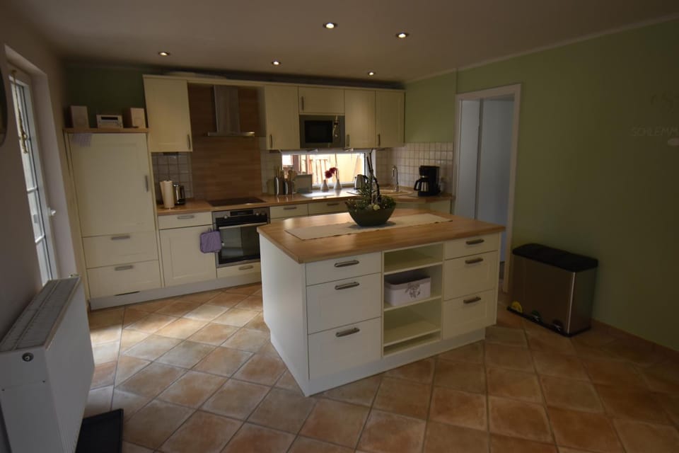 Kitchen or kitchenette, dishwasher, oven, stove, toaster