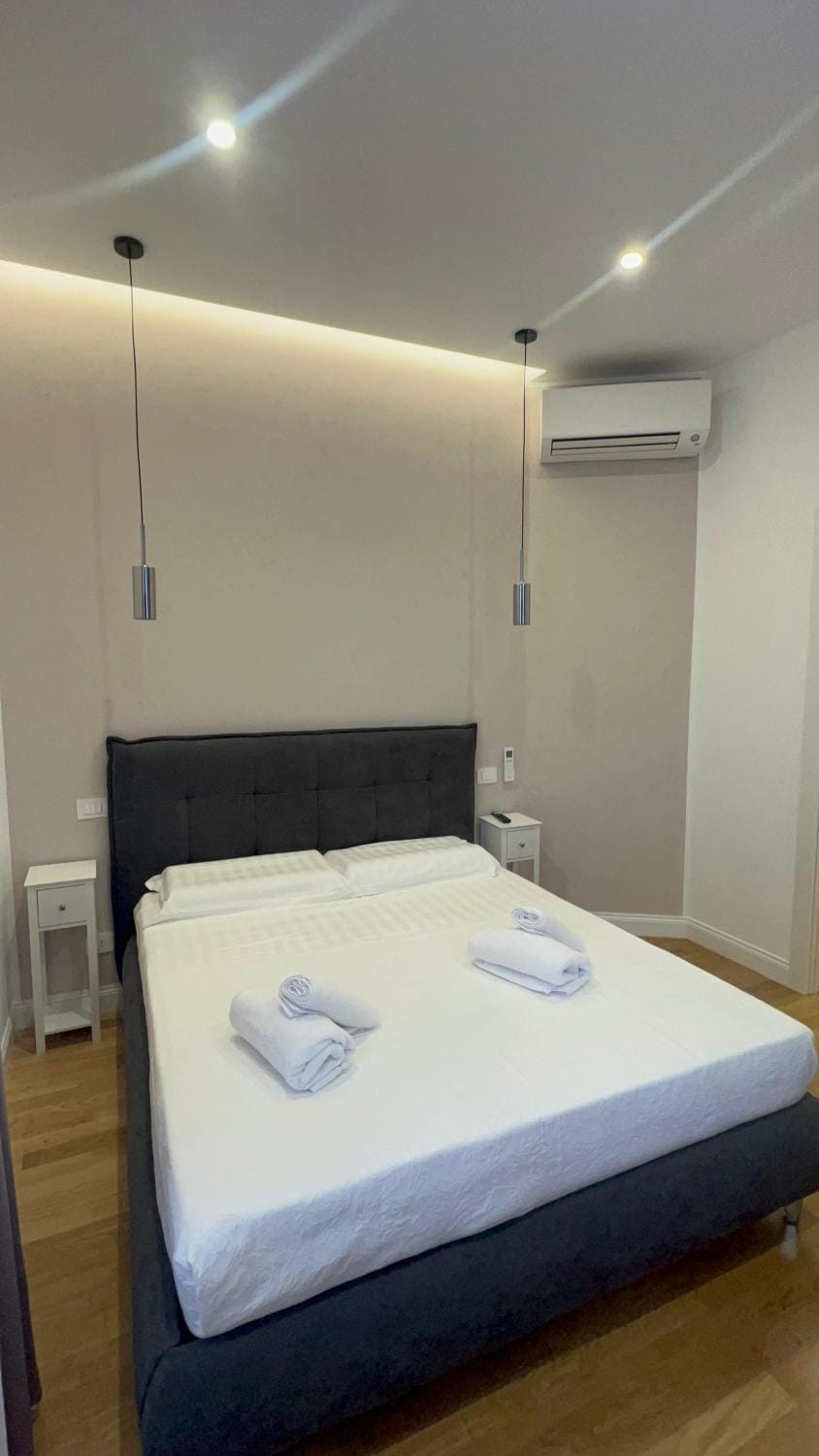 Bed, Photo of the whole room, Bedroom, towels, air conditioner