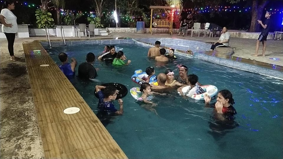 Night, People, Natural landscape, Pool view, Swimming pool, children, group of guests
