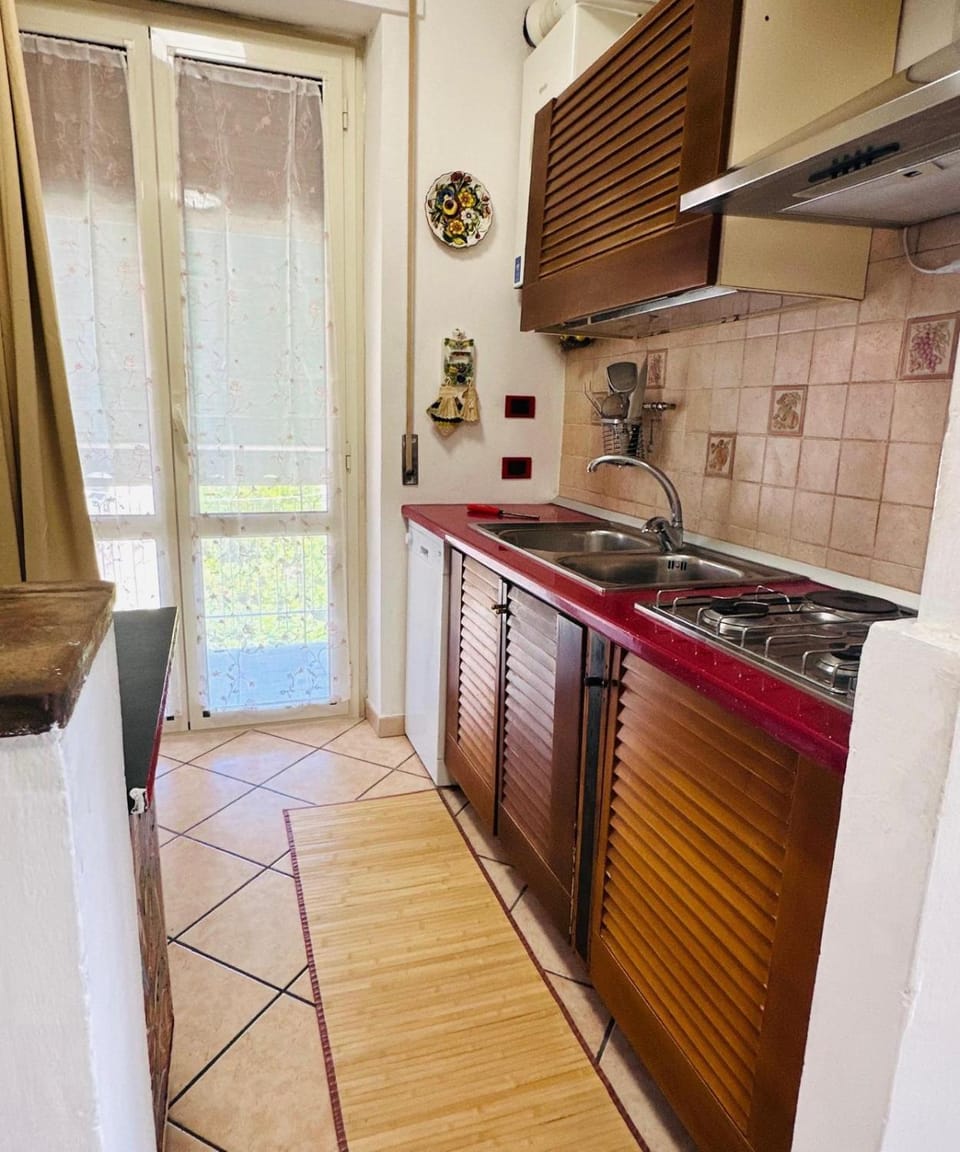 Kitchen or kitchenette, dishwasher, stove