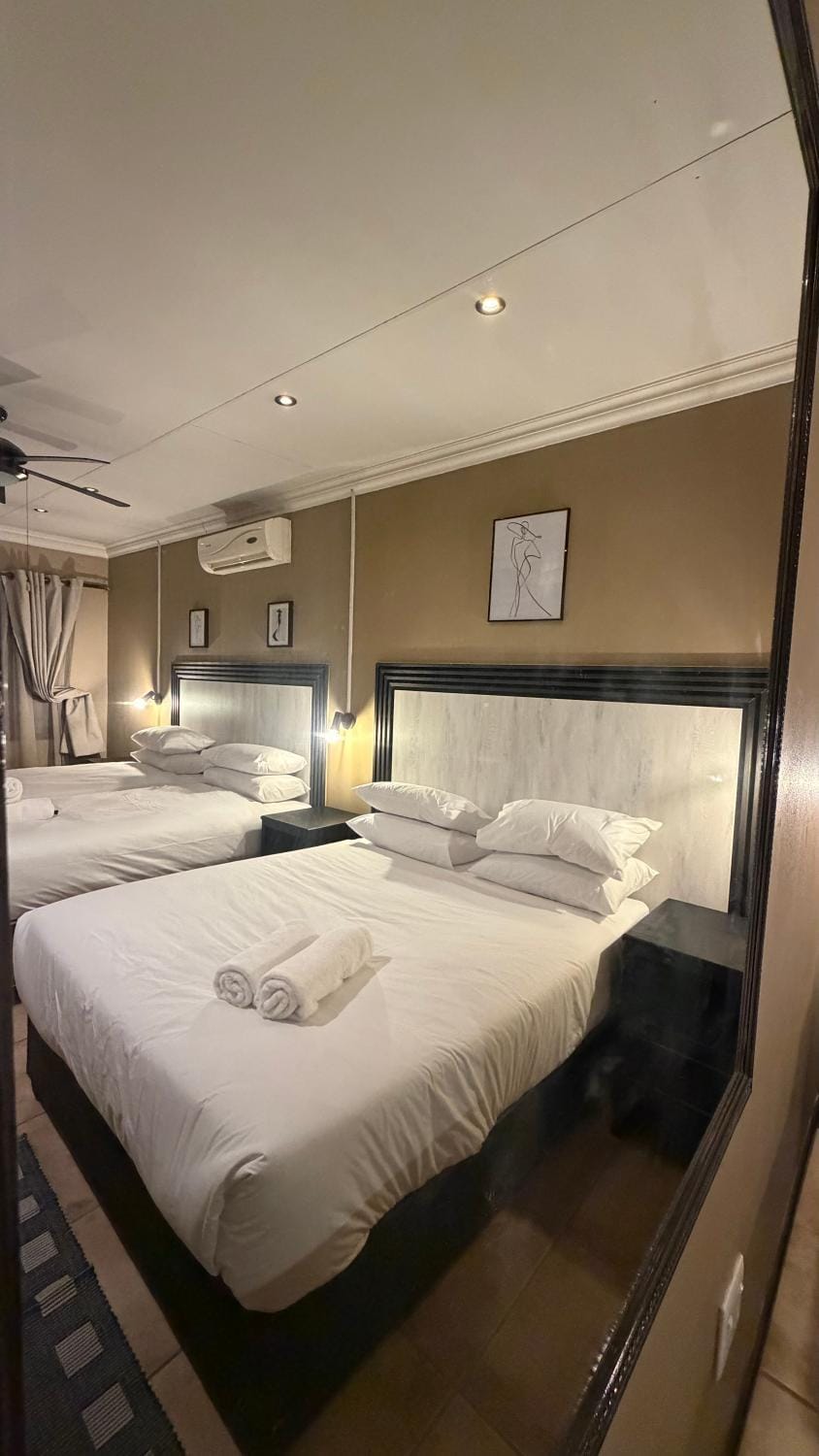 Bed, Photo of the whole room, Bedroom, towels, air conditioner
