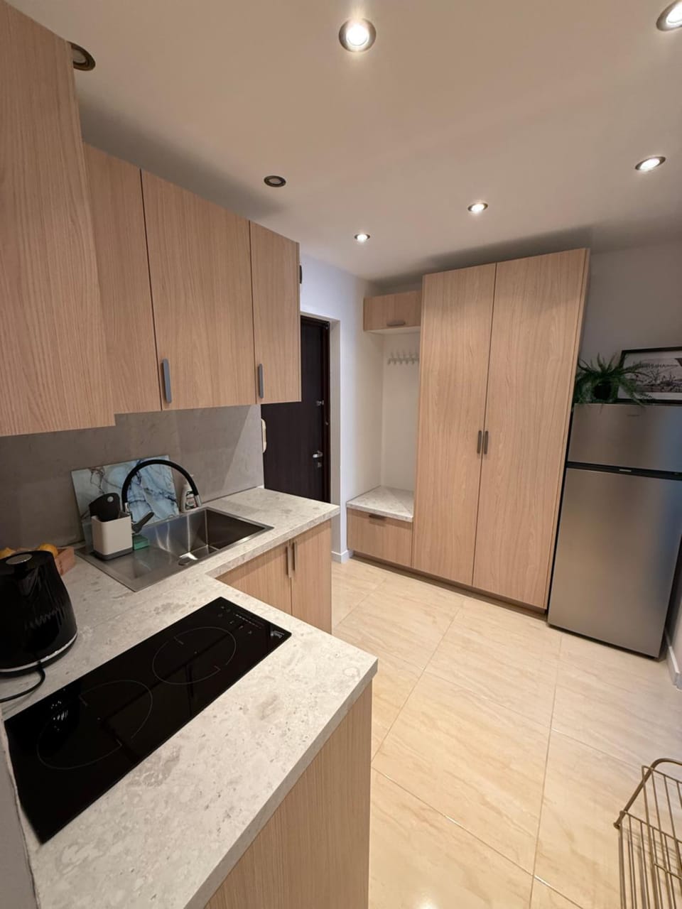Kitchen or kitchenette, oven, stove, wardrobe