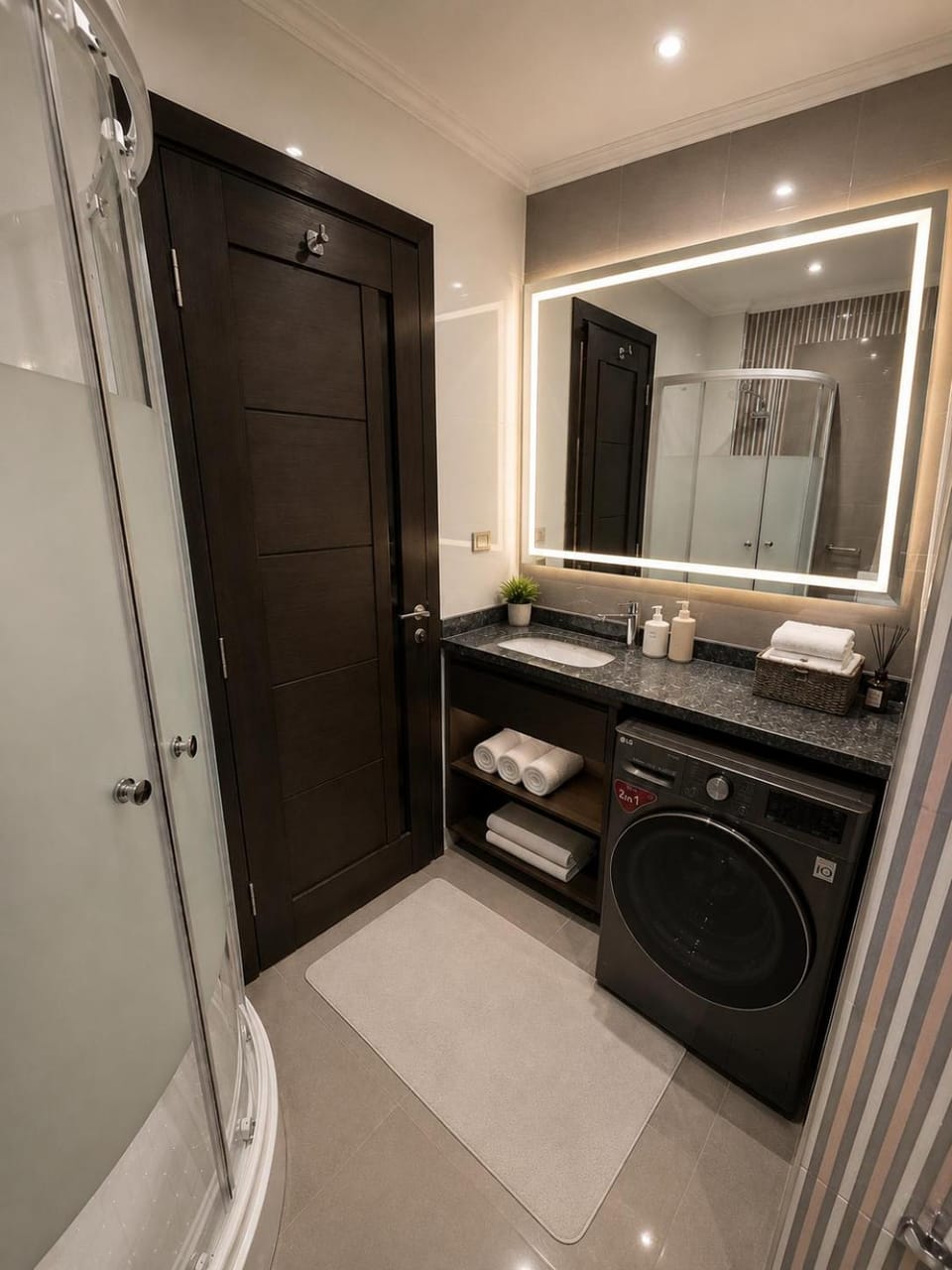 Shower, Toilet, Bathroom, towels, washing machine, dryer