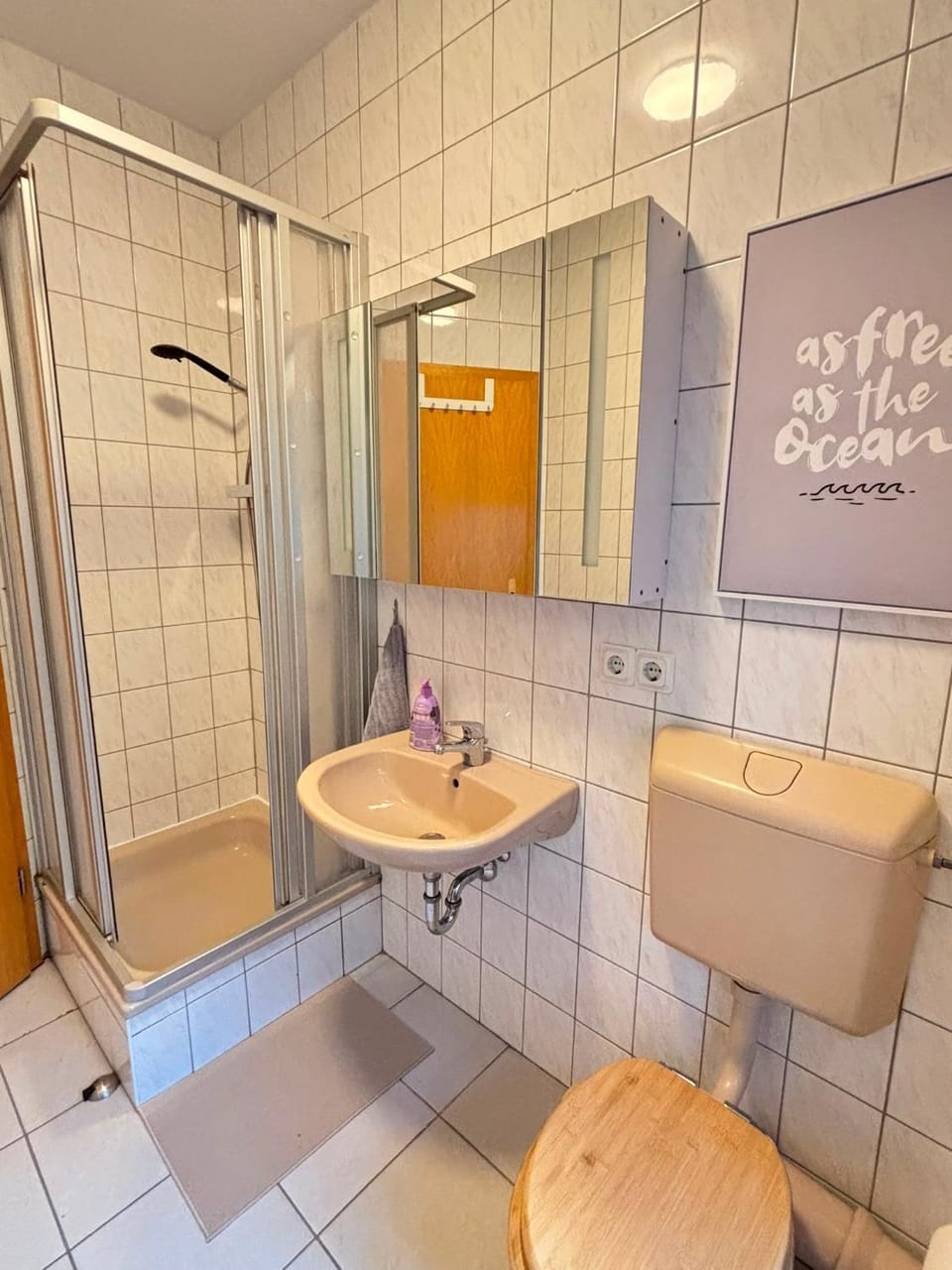 Shower, Toilet, Bathroom, hair dryier, towels