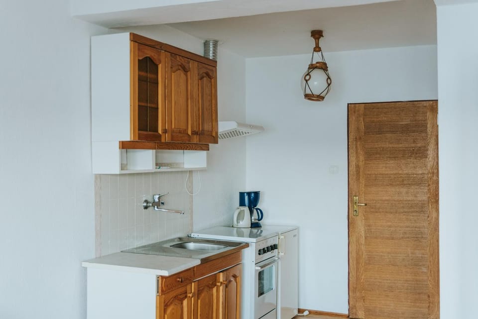 Kitchen or kitchenette, stove