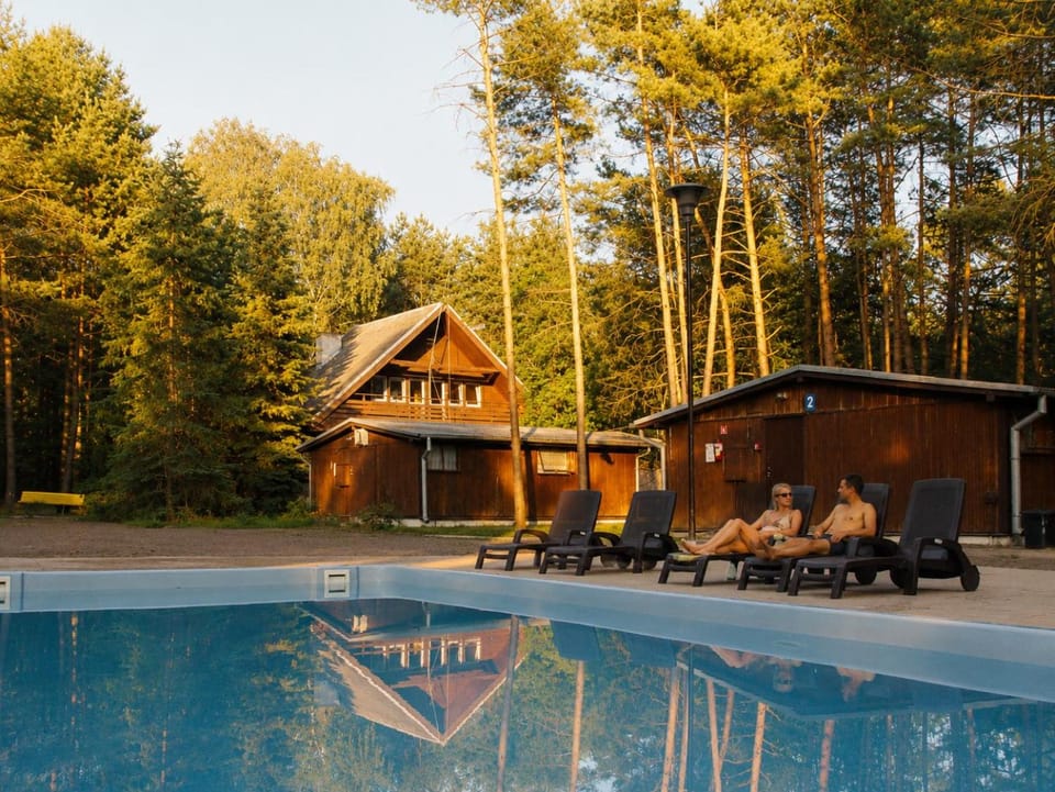 Property building, Natural landscape, Pool view, Swimming pool, sunbed