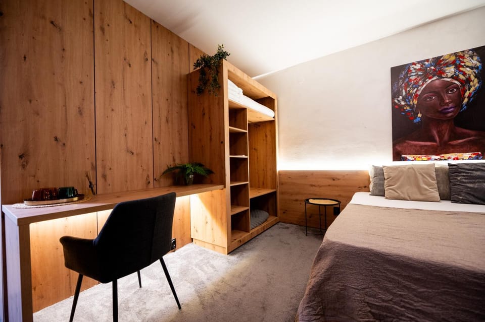 Bed, Living room, Photo of the whole room, Seating area, Bedroom, hair dresser, wardrobe
