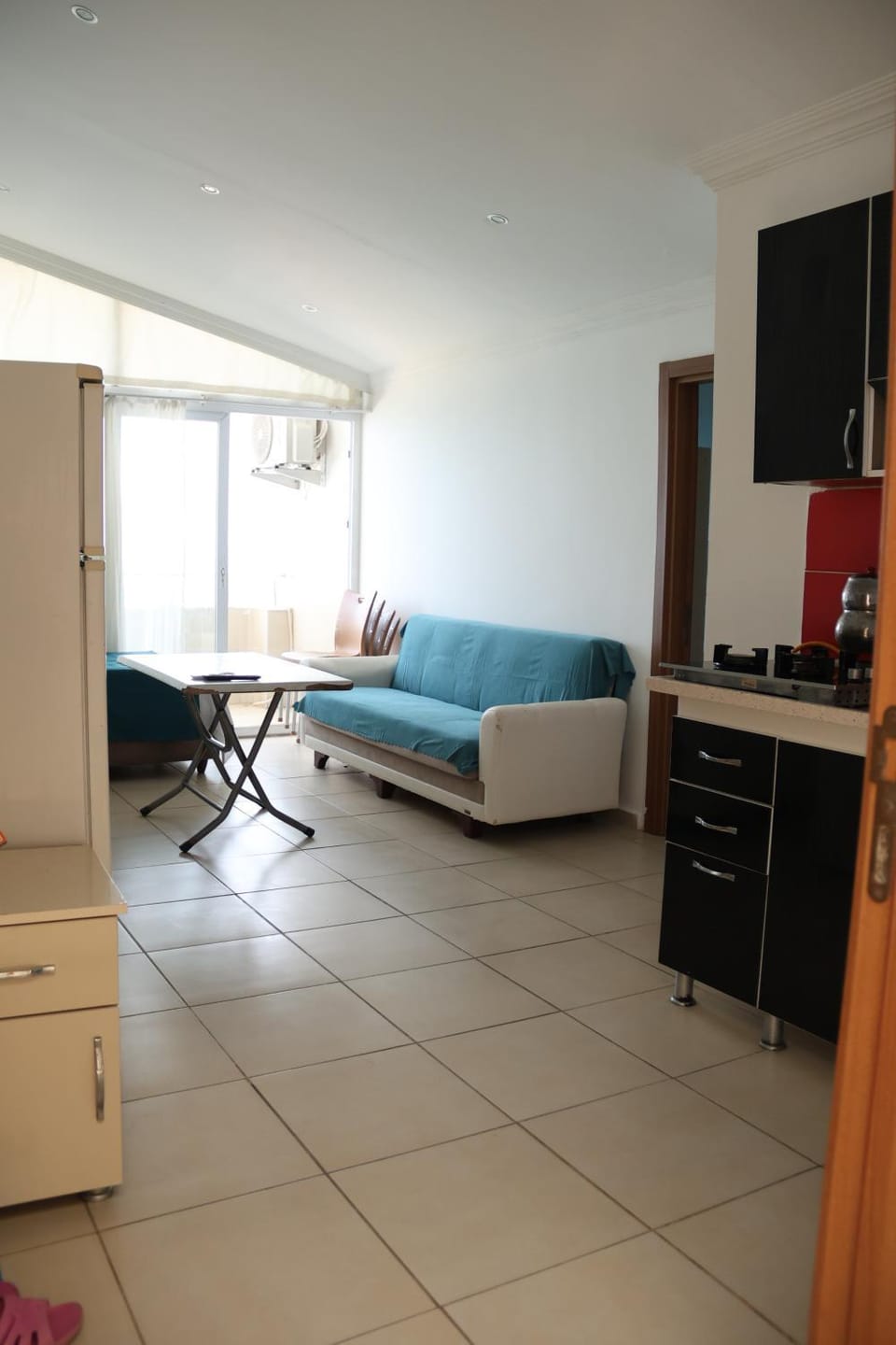 Bed, Kitchen or kitchenette, Seating area
