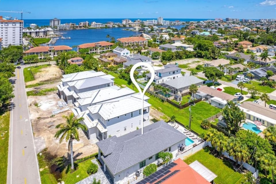 Naples Park Duo Estate 8BR 7.5BA Private Pool Home Sleeps 20 Near Vanderbilt Beach Mercato House in Naples Park
