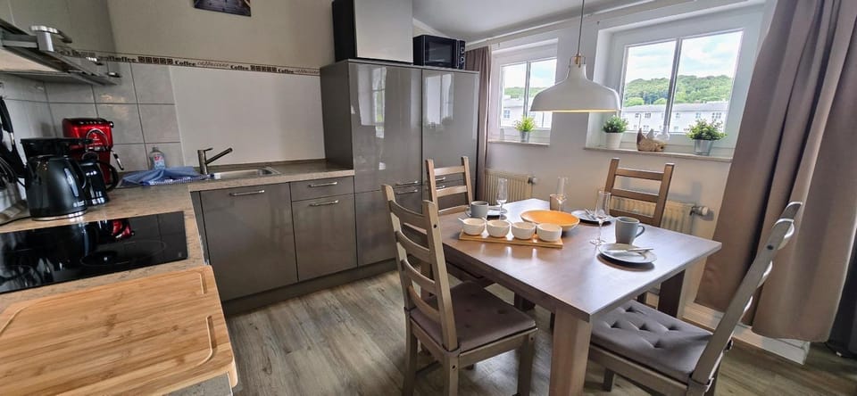Kitchen or kitchenette, dishwasher, oven, stove, toaster