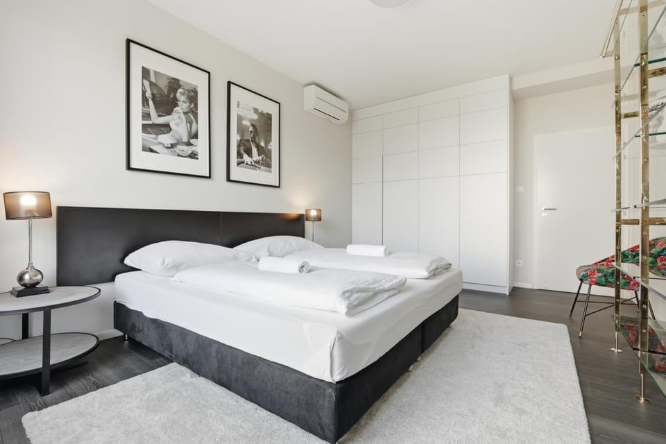 Bed, Photo of the whole room, Bedroom, towels, air conditioner