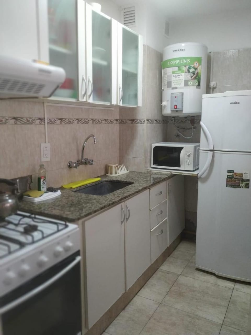 Kitchen or kitchenette, oven