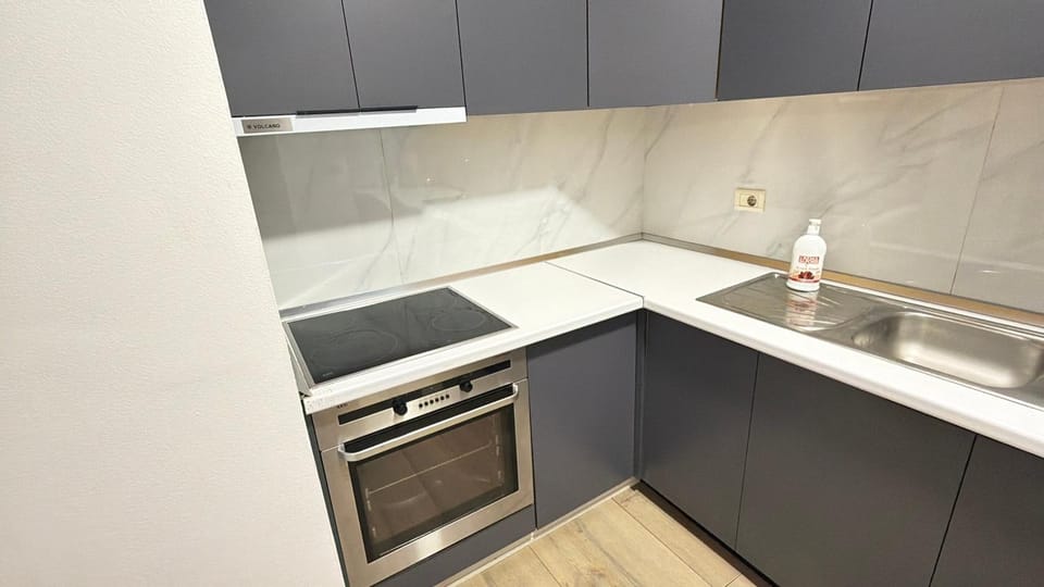 Kitchen or kitchenette, stove