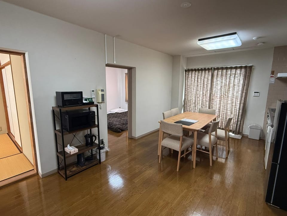 Dining area, microwave, oven, air conditioner