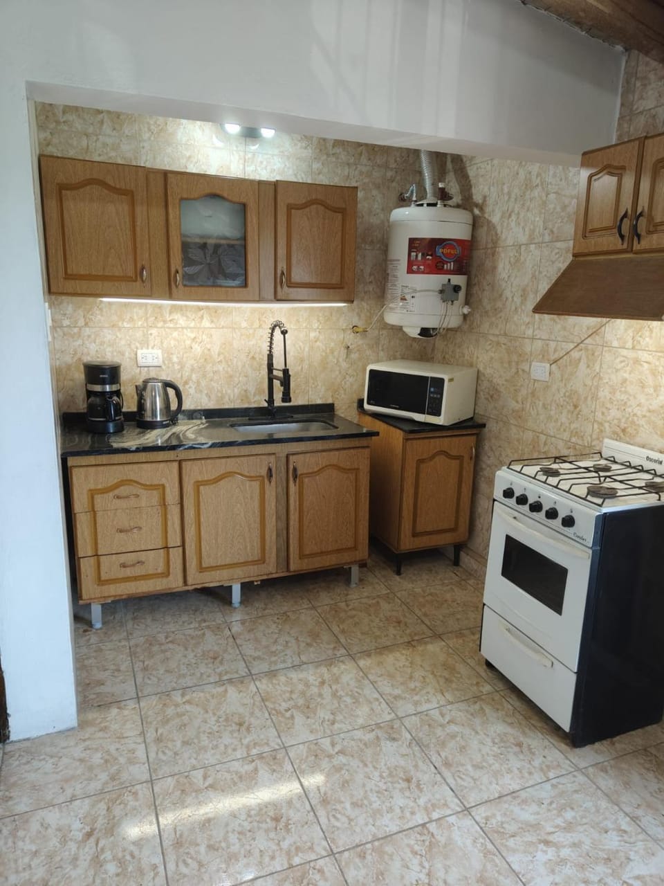 Kitchen or kitchenette, oven, stove, toaster