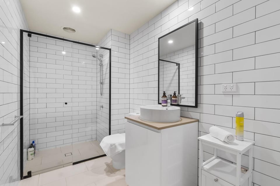 Shower, Toilet, Bathroom, hair dryier, towels