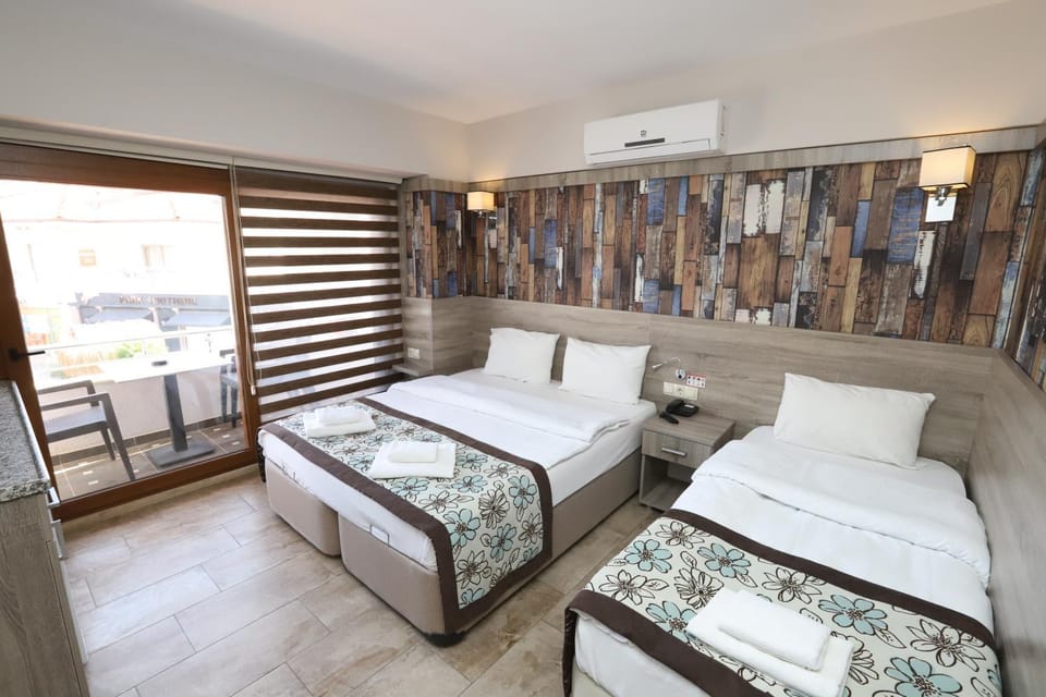 Bed, towels, air conditioner
