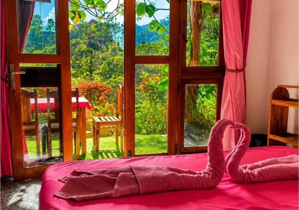 Bed, Natural landscape, Garden, View (from property/room), Seating area, Bedroom, Garden view, Mountain view, towels