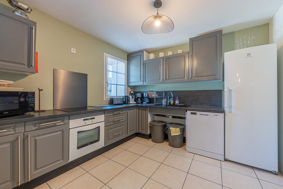 Kitchen or kitchenette, dishwasher, oven, stove, toaster
