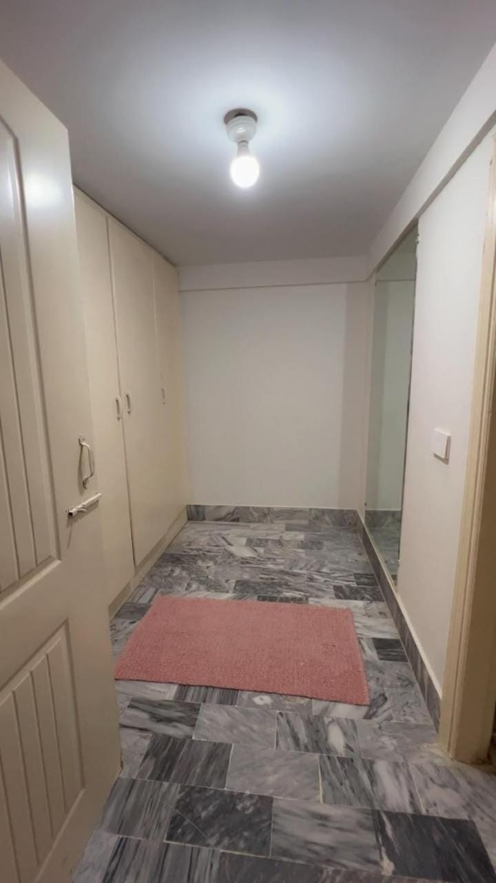 Spacious AC Bedroom with Wardrobe and Bathtub Apartment in Karachi