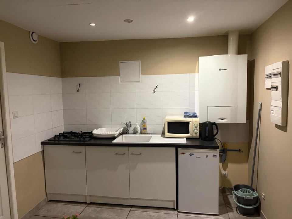 Kitchen or kitchenette, stove