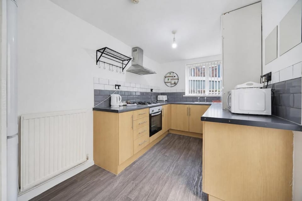 Kitchen or kitchenette, oven, stove, toaster