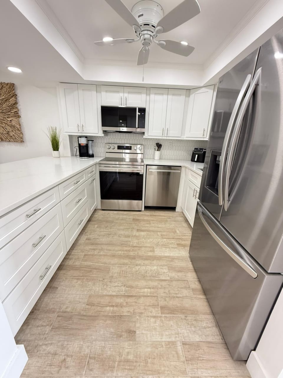 Kitchen or kitchenette, dishwasher, oven, stove, toaster