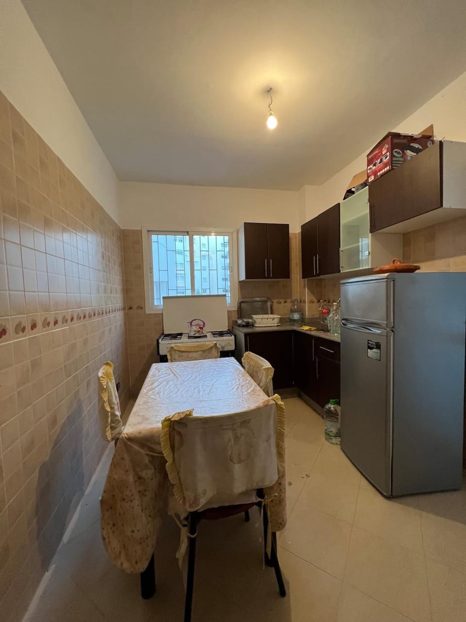 Kitchen or kitchenette, dishwasher, oven, stove