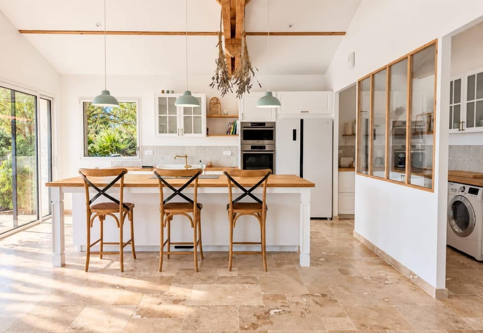 Kitchen or kitchenette, Seating area, Dining area, dishwasher, microwave, oven, stove, toaster, washing machine, washing machine, dryer
