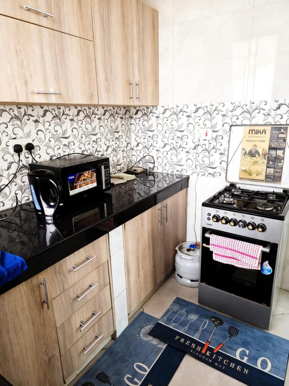 Kitchen or kitchenette, oven, stove, toaster