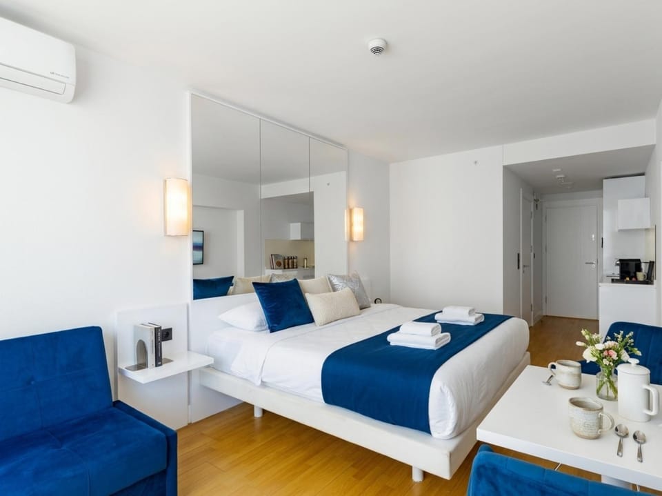 Bed, Photo of the whole room, Bedroom, towels, air conditioner