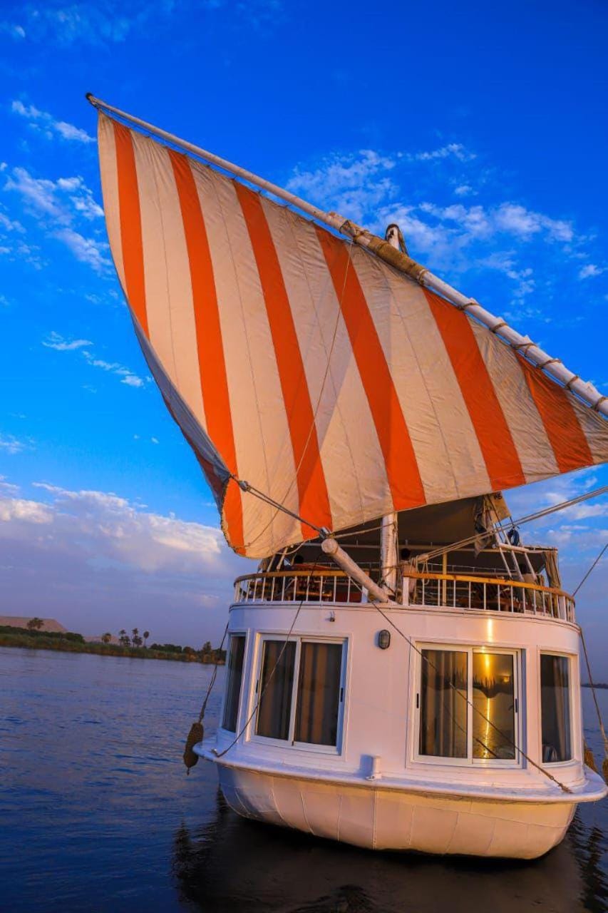 Three pyramids Dahabiya Docked boat in Luxor Governorate