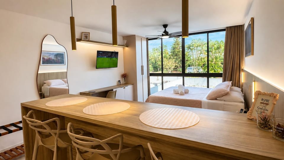 Bed, TV and multimedia, Living room, Photo of the whole room, Seating area, Dining area, Bedroom