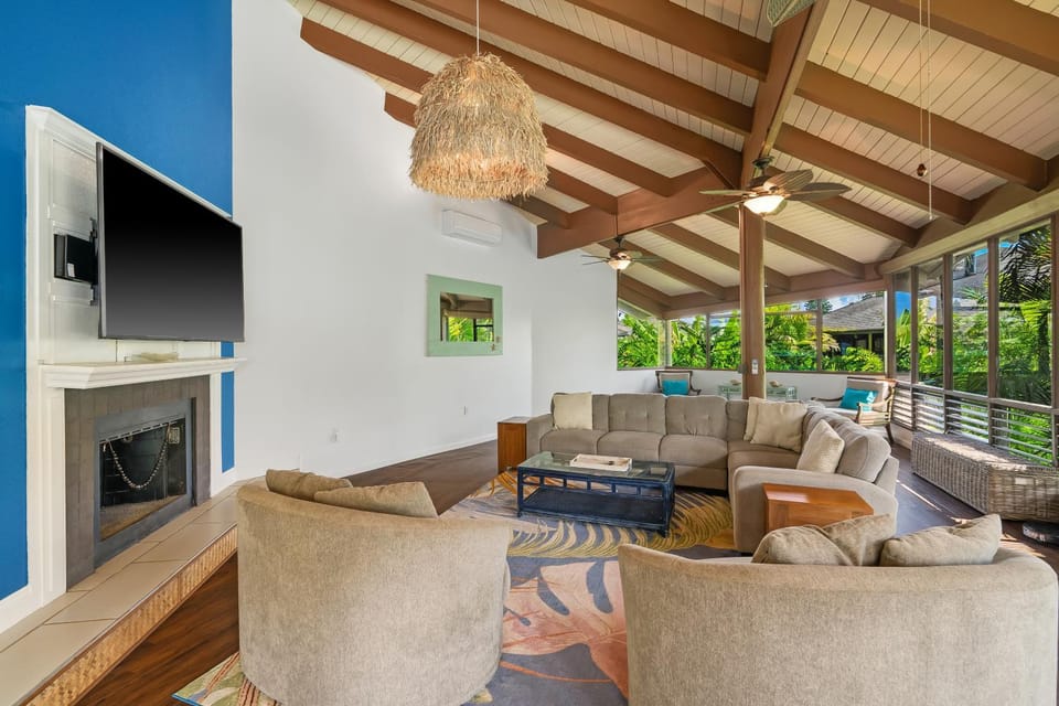 Day, TV and multimedia, Living room, Seating area, fireplace, furniture, air conditioner